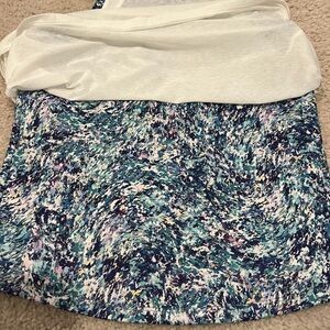 Athleta girl tank top with white sheer tshirt material over printed tank top